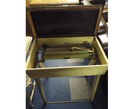 An Enamel Topped Mangle Table.