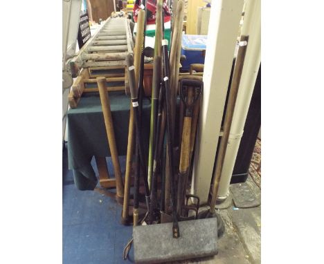 A Collection of Garden Tools to Include Forks Spade, Pick Axe, Hose Etc.