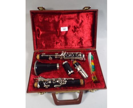 A Cased Evette Clarinet.