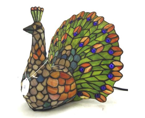 A Tiffany style peacock table lamp by the Kind Light Manufactory Ltd, electrified, H29cm 