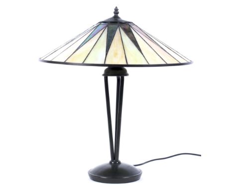 A contemporary Tiffany style table lamp, with starburst pattern glass shade, 54cm high