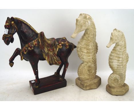 A painted ceramic horse in the Chinese style and two seahorse ornaments, maximum H37cm