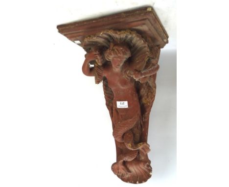 A late 19th/early 20th century terracotta wall bracket, in the form of a mermaid, H46cm