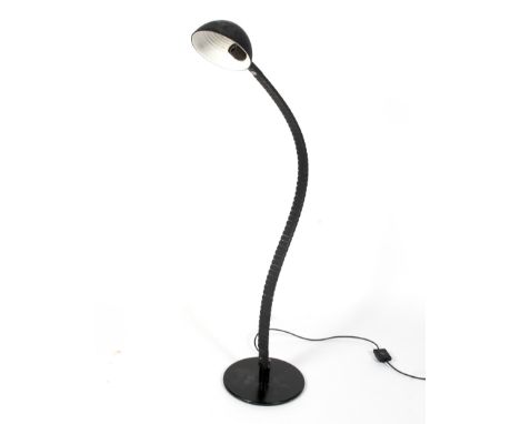 A Martinelli Vertebra 1970's floor lamp Condition Report: Black in colour. Would benefit from a clean. Some marks and scratch