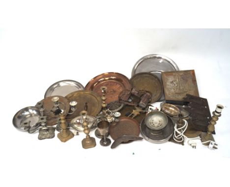 An assortment of metalware and mixed collectables, including: a copper Arts and Crafts panel of a ships, various trays, candl