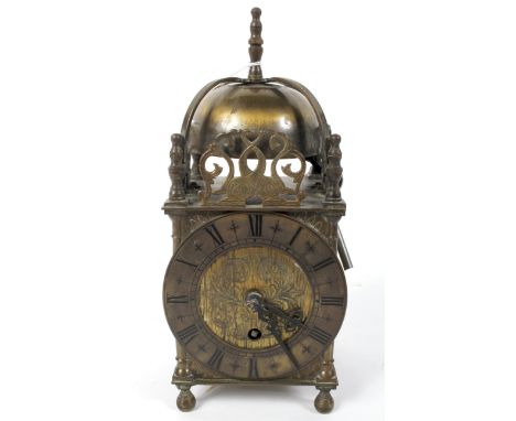 A brass lantern clock, early 20th century, the mechanism marked Empire, with key, 23.5 cm high