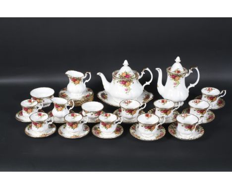 A Royal Albert Old Country Roses pattern part tea and coffee service, with six settings for tea and four coffee settings, wit