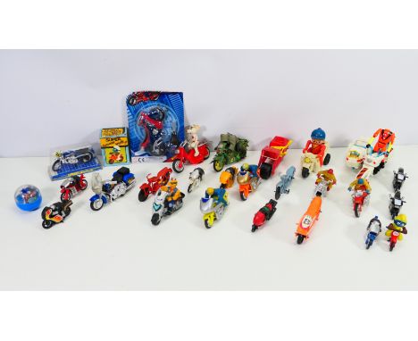 Schleich - Other - A group of mostly unboxed motorcycle models including a Smurf on a bike, Danger Mouse on a bike, a Crash T