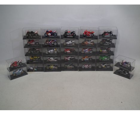 Deagostini - A collection of 29 x racing motorcycle models in 1/24 scale including Yamaha TZ250L, Ducati 996R, Aprilia RSV250