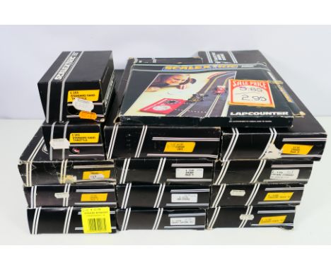 Scalextric - 14 boxes of vintage predominately Scalextric track. Lot includes Scalextric C151 Standard Curves; C160 Straights