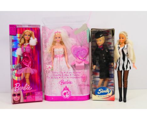 Pedigree - Sindy - A group of predominately boxed dolls. Lot includes Pedigree Julien MacDonald British Airways Sindy doll; B