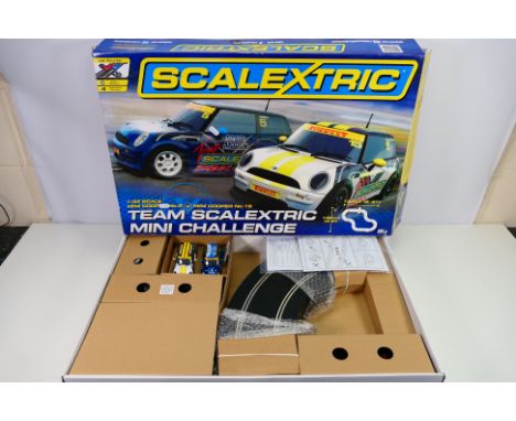 Scalextric - A boxed Scalextric C1320 'Team Scalextric Mini Challenge' set. The set appears to be in Mint condition. The box 