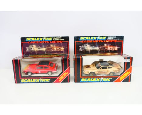 Scalextric - Two boxed Scalextric slot cars 'with lights'. Lot consist of Scalextric C300 Capri with lights; together with C2