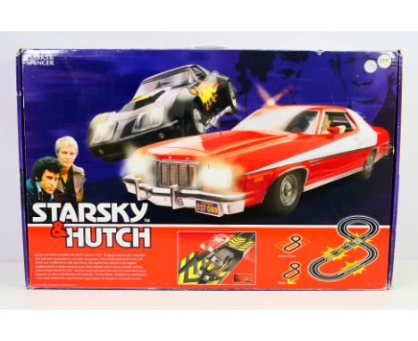 Scalextric - A boxed Scalextric C1151 Marks & Spencer 'Starsky & Hutch' set. The set comes with Ford Torino and Chevrolet Cor