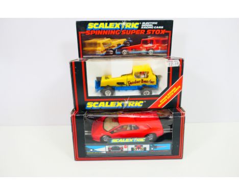 Scalextric - Two boxed Scalextric slot cars, comprising of a 1980's Scalextric C286 Super Stox Fender Bender; together with a