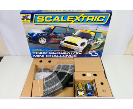 Scalextric - A boxed Scalextric C1320 'Team Scalextric Mini Challenge' set. The set appears to be in Mint condition. The box 