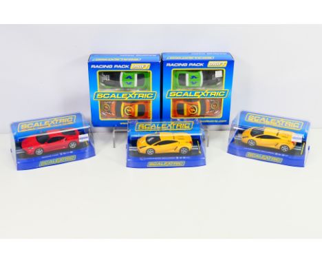 Scalextric - A boxed collection of Scalextric slot cars. Lot consists of Scalextric C2955 2x Nissan 350Z Drift Cars (x2); C28
