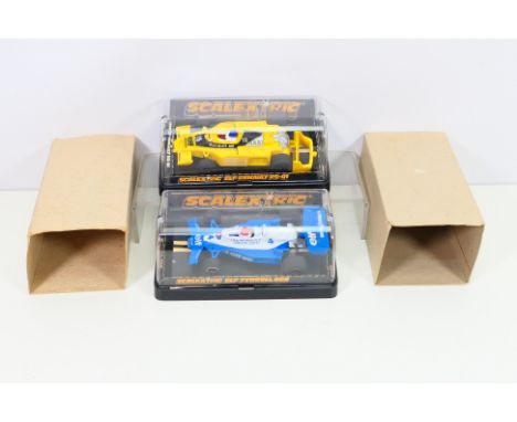 Scalextric - Two boxed vintage Scalextric F1 slot cars, comprising of a Scalextric C135 Elf Tyrell 008; together with C134 El
