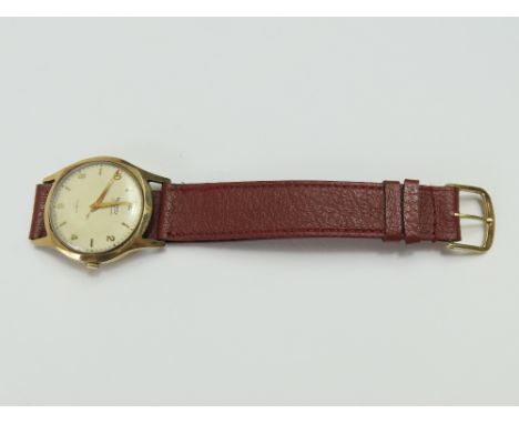 Rotary - a vintage gentleman's 9ct gold mechanical wind wristwatch, the round, textured cream dial with gold baton markers an