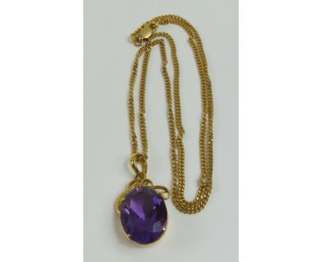 An oval facetted amethyst set into a simple decorative mount, on a filed curb link chain, marked '750', 46cm long, 10.49g gro