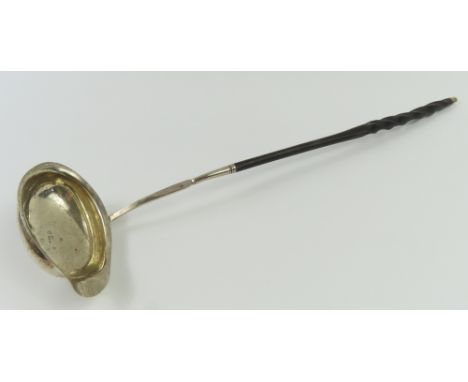 A Georgian silver toddy ladle with twisted handle. Made by Elizabeth Morley in London 1795. 36cm long, 1.26 Troy oz (weighabl