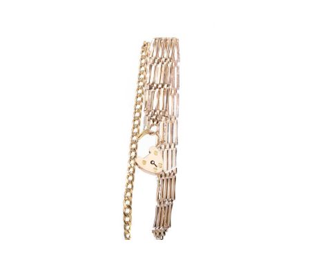 GOLD GATE BRACELET AND A CURB LINK BRACELET,each in nine carat gold, 23.8g gross (2)