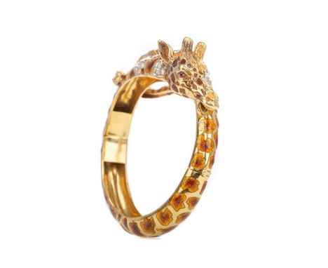 DIAMOND AND ENAMEL GIRAFFE BANGLE,modelled realistically, with brown enamel, the head and tail set with diamonds and the eyes