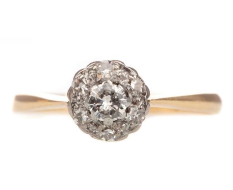 DIAMOND CLUSTER RING,the round brilliant cut diamonds totalling approximately 0.15 carats, marked 18CT &amp; PLAT, size K, 1.