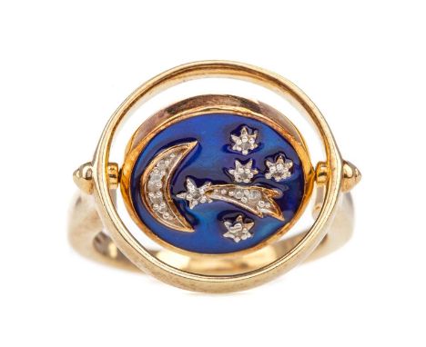 GOLD PLATED ENAMELLED SWIVEL RING,one side set with crescent moon and shooting star, the other with a floral design set with 