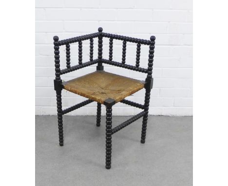 Arts &amp; Crafts ebonised bobbin corner chair with woven seat, 68 x 56cm 