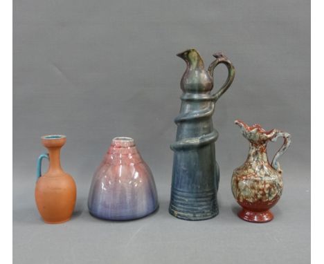 Collection of late 19th and early 20th century art pottery to include a Dutch jug with a serpent handle, squat vase signed Ma