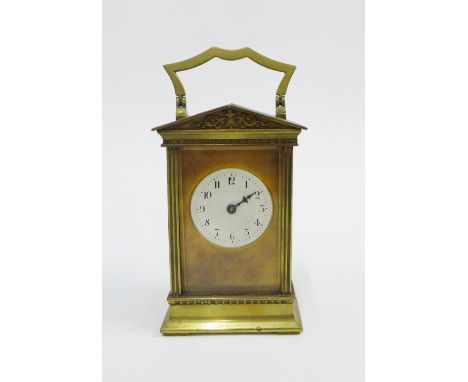 French brass and glass panelled carriage clock with a white enamelled dial and Arabic numerals, (a/f and one hand lacking) ca
