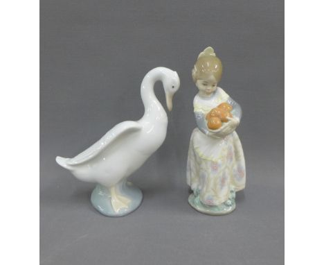 Lladro porcelain girl with a basket of oranges and a Nao duck, tallest 17cm (2)