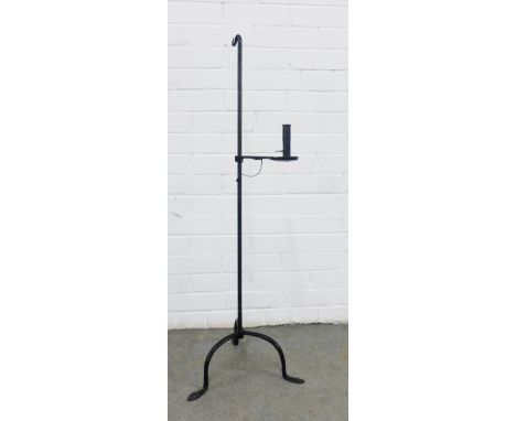 Wrought iron rush light and candle holder, on a tripod base, 105cm 