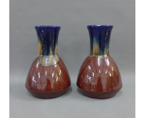 Pair of 1920's art pottery vases, 22cm high 