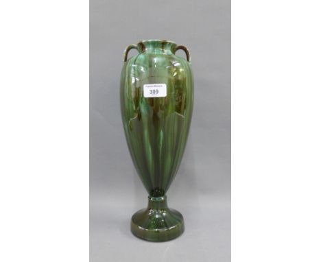 Early 20th century Clement Massier French art pottery vase with loop handles and circular footrim, 36cm high 