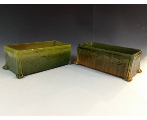 A Bretby rectangular planter, as a trough, glazed in merging green tones, the side panels moulded as stylized wooden grain, s