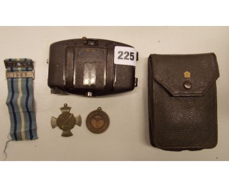 VINTAGE BAKELITE CORONET CAMERA IN CASE AND TWO MEDALS