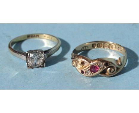 An 18ct gold gypsy ring set rubies and white stones, size M, 2g and an 18ct gold and platinum ring set white stone, size K½, 