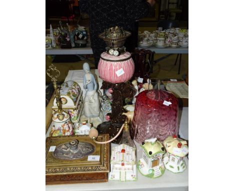 Four Coalport cottages, a modern Capodimonte casket and bell, a Carltonware vase, various figure ornaments, a ceramic oil lam