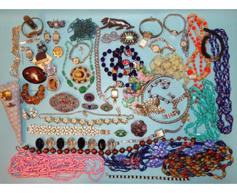 A quantity of costume jewellery, a 9ct-gold-cased lady's Rotary wrist watch and other lady's wrist watches. 