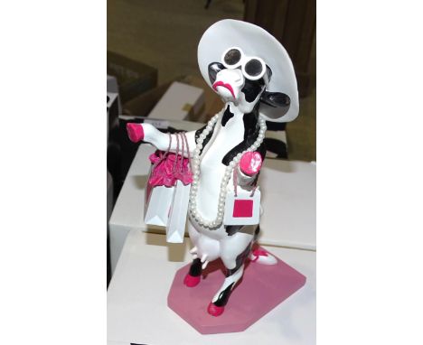 A collection of eleven boxed Westland Giftware "Cow Parade" figures: The Meercows, Alphadite Goddess of Shopping, Circus Cown