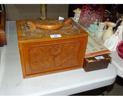 A Mah Jong set in carved chest, with lift-up front concealing five drawers, with carrying handle, 26cm wide, 17cm high, 18cm 