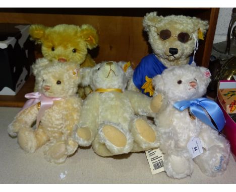 A collection of five modern Steiff bears: 'The Millennium Bear', 'The 2001 Bear', 'Charlotte, The Royal Baby Bear' and 'Georg
