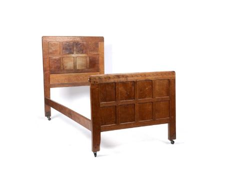 Robert "Mouseman Thompson" of Kilburn: a mid-20th Century oak single bed (probably 1930's),  the head and footboard each with