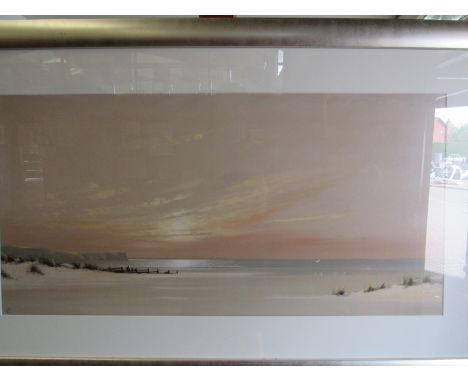 A coloured print of a beach scene, framed and glazed, 41cm x 82cm