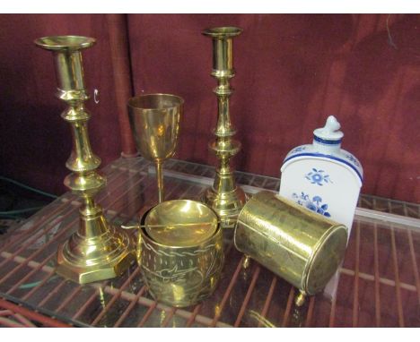Five pieces of brass ware including a pair of candlesticks, with a Spode Glouster ceramic bottle (6)
