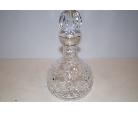 Silver cut class decanter with cut glass top Height 23 cm