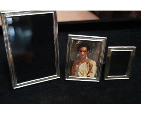 Collection of 3 silver photograph frames Largest 11 cm 