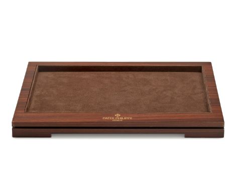 PATEK PHILIPPE DISPLAY TRAY - In wood with brown cloth centre. Size: 3,5x43x31 cm.